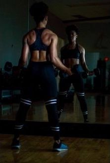 woman lifting weights